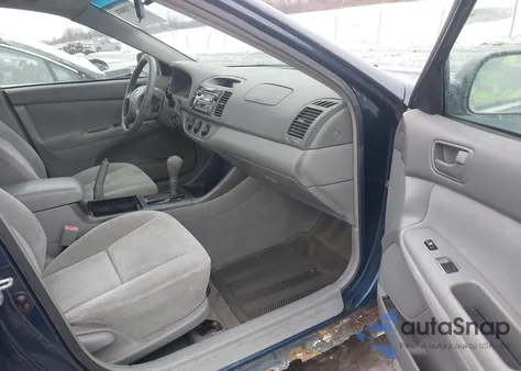 2002 Toyota Camry Le from USA, damaged, VIN 4T1BE32K82U523428